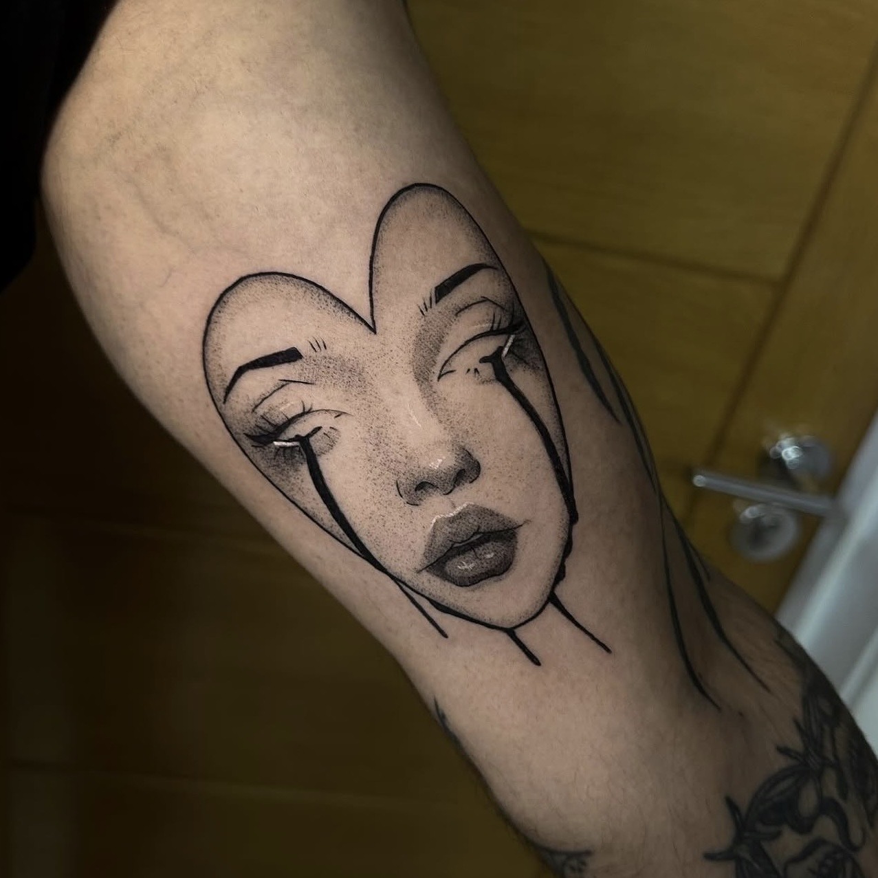 Pop culture blackwork tattoo by Demi