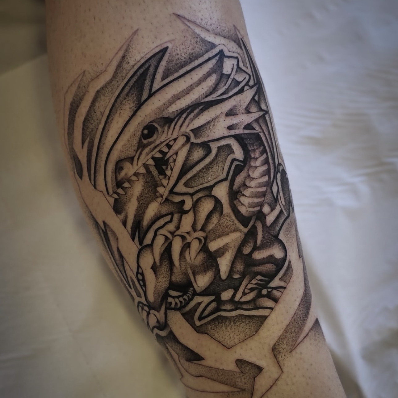 Stippled skull tattoo by Elliot
